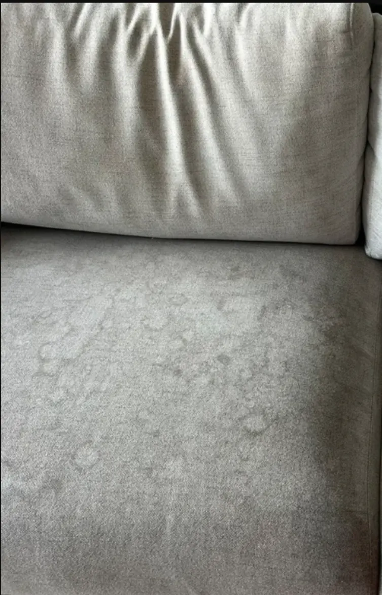 Couch before steam clean - stained